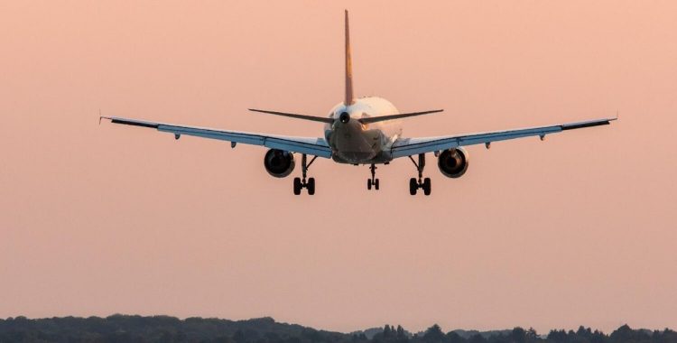 Passenger airplane approaching Dusseldorf International Airport. Germany.