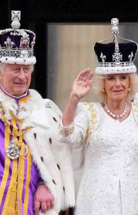 Britain's King Charles III and Queen Camilla wave to the crowds from the balcony of Buckingham Palace after their coronation ceremony in London on May 6.