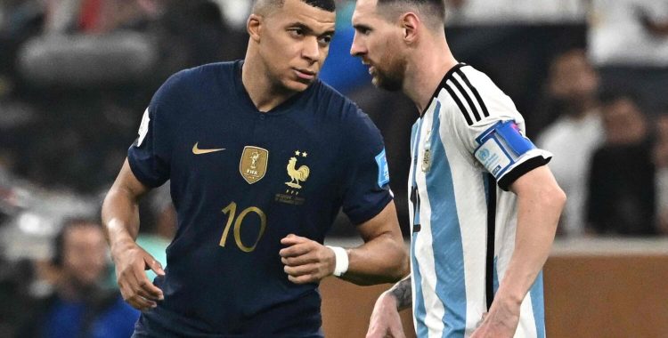 France's Kylian Mbappe (left) with Argentina's Lionel Messi during the World Cup final in Lusail, Qatar, on December 18. — AFP