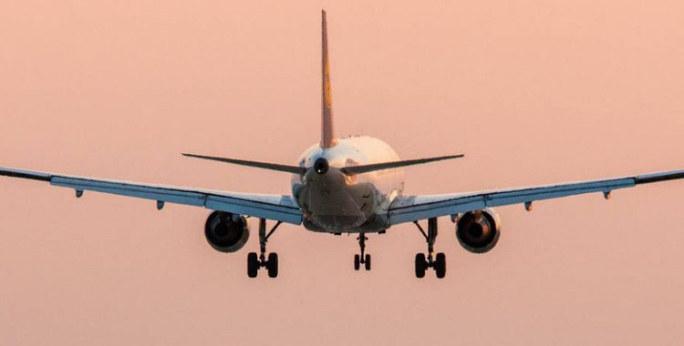 Passenger airplane approaching Dusseldorf International Airport. Germany.