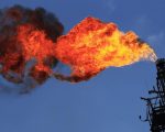 Excess natural gas is being flared, or burnt off, at a flare stack at the refinery in Tula